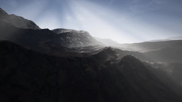 mountain landscape in high altitude with rays of light