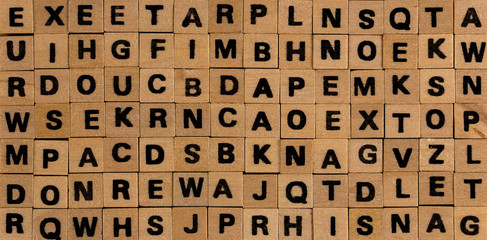 background with letters on wooden blocks