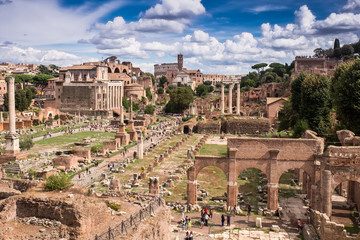 Obraz na płótnie Canvas Panoramic view of the Roman Forum Foro Romano and Ruins of Septimius Severus Arch and Saturn Temple in Rome, Italy