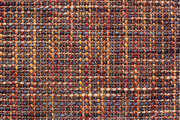 The texture of the fabric. Motley checkered fabric with a fleecy thread. Copy space.