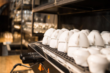 Professional coffee machine with empty cups