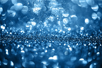 Close up view of blue glitter texture background.