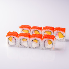 sushi with mango on white background