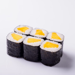 sushi with mango on white background