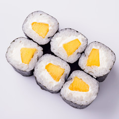 sushi with mango on white background
