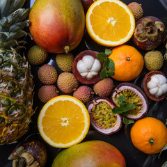 mango orange and different tropical fruits 