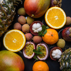 mango orange and different tropical fruits 