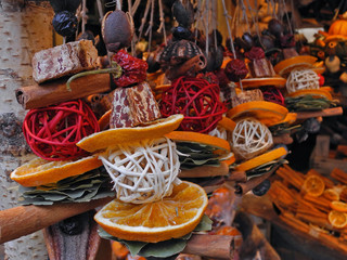 Decorative garlands of spices and dried fruits in Budapest spice shop. Organic souvenir. Natural food background. 