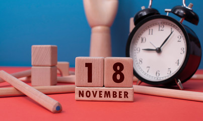 November 18 written with wooden blocks