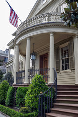 Balcony, windows, and front entrance of a Southern home