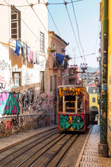 Obraz premium Ascensor da Bica, Tram / Funicular with graffiti in Lisbon, Portugal