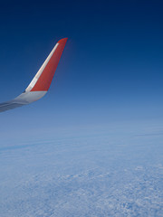 airplane wing in the sky vertical