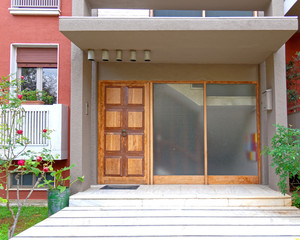 modern apartment building entrance wood and glass door, Athens Greece
