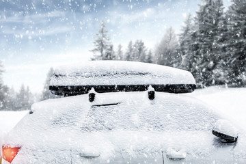 Black car of snow and free space for your decoration. 