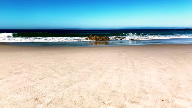 Sea landscape panorama. The long beach.