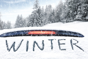 Black car of snow and free space for your decoration. 