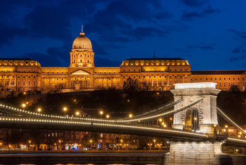 Fototapeta na wymiar Royal Palace or the Buda Castle and the Chain Bridge after sunset in Budapest in Hungary.