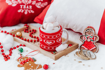 Marshmallow cup with Christmas decorations. Still life winter concept. Cozy morning.