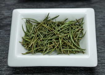Rosemary herb. Colorful spices in white bowls Seasonings for cooking. Natural Herbs & Spices.