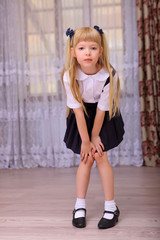 Cute cosplay little asian girl in school uniform