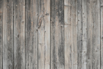 Grey wooden background. Old grey wooden fence texture. Old wood texture background