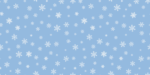Vector snowflakes background. Simple Christmas and New Year seamless pattern with snow, different small white snowflakes on blue background. Winter holidays theme. Design for decor, banner, wallpapers