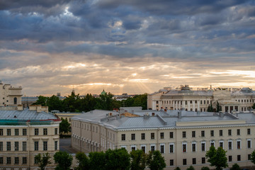 Fototapeta premium Cityscape view at sunset of St. Petersburg from the roof