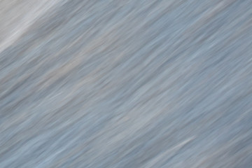 abstract gray metal background in blurred motion, full frame