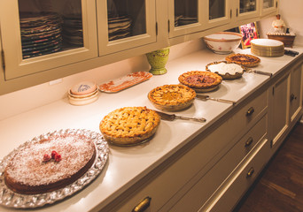 Holiday season pies sitting on a counter top © Ted