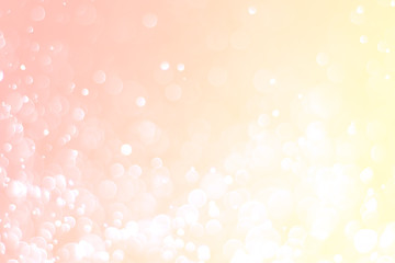 Abstract bokeh lights with light yellow and orange background, beautiful bokeh from water droplets