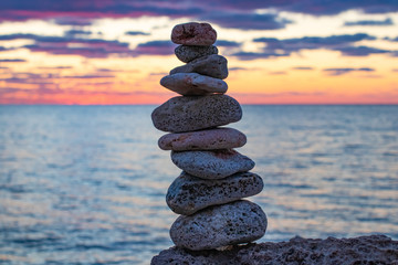 Zen concept. Sunset. The object of the stones on the beach at sunset.  Relax & Meditation. Zen stones.