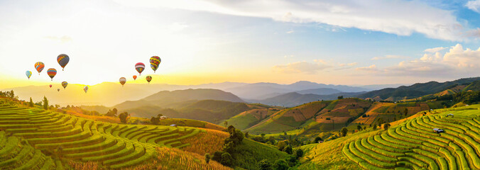 Colorful Hot Air Balloons. Beautiful Sunset scene at Pa Bong Piang terraced rice fields, Mae Chaem,...