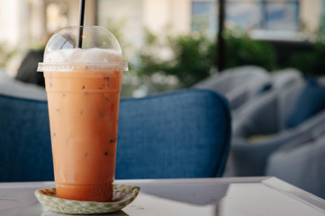 Thai iced tea placed on the table