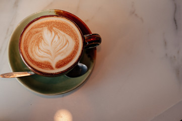 Hot latte coffee placed on the table