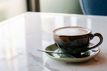 Hot latte coffee placed on the table