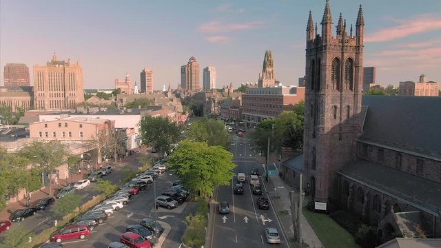 Aerial: Establishing shot of broadway street & church near Yale University t. New Haven, Connecticut, US