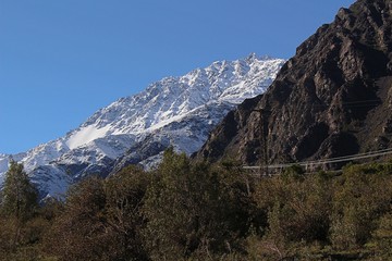 Beautiful mountain landscape in Cajón del Maipo, Chile. Snowy mountain and valley in Chilean central Andes