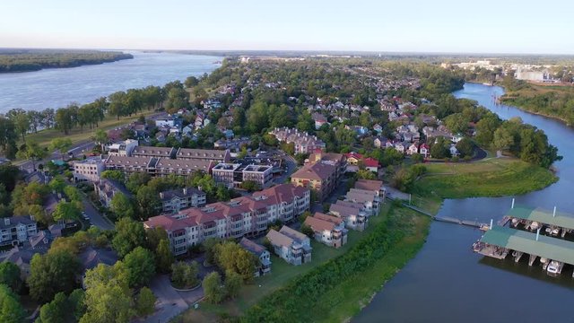 Aerial over generic upscale neighborhood with houses and duplexes in a suburban region of Memphis Tennessee, Mud Island.