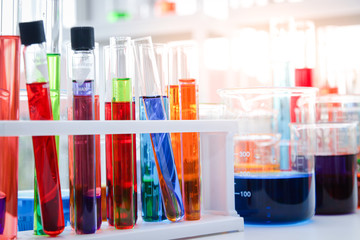 Many chemical test tubes in the lab room