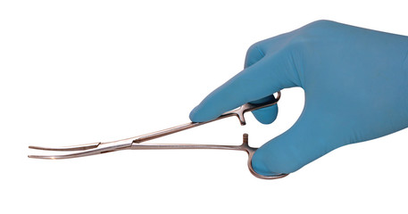 hand in a blue glove holds a medical instrument isolated on a blue background, surgeons save lives