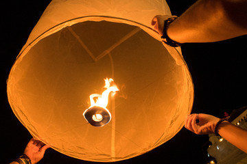 Fototapeta na wymiar Loy Krathong lantern release closeup