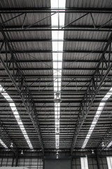 Warehouse metal roofing, Large steel roof structure, bottom view with skylight translucent roof.