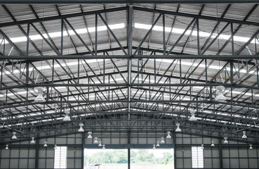 Warehouse metal roofing, Large steel roof structure, bottom view with skylight translucent roof.