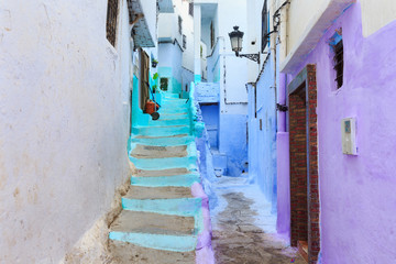 View of the colorful old walls of Tetouan Medina quarter in Northern Morocco. A medina is typically walled, with many narrow and maze-like streets and often contain historical houses, palaces, places.