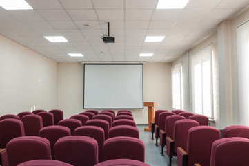 Modern conference room with comfortable Burgundy chairs