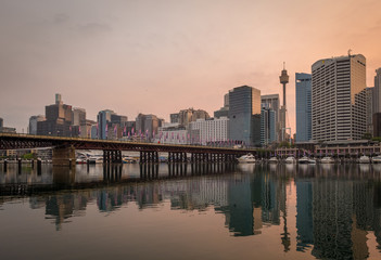 Fototapeta na wymiar Sydney skyline with pedestrian bridge in the morning