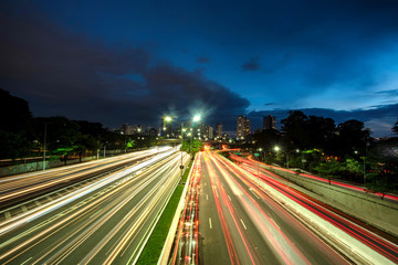 Fototapeta na wymiar Long exposure light trails in Sao Paolo, Brazil at sunset and early evening