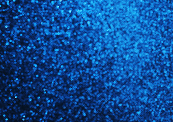 Obraz premium Blurred texture of glitter sparkling paper. Color of the year 2020.