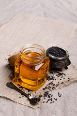 Glass jar with oil.