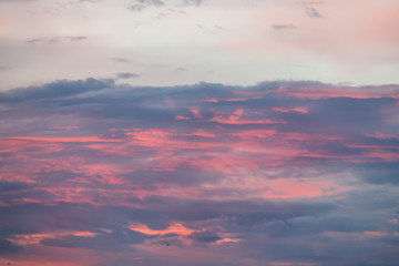 Bright colored blue and orange sky at sunset.